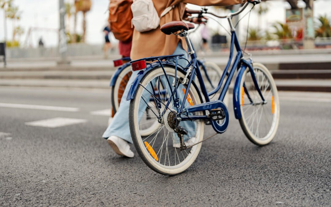 Cropped picture of legs crossing crosswalk on the street with bikes to show Outdoor Spots by Village Gate